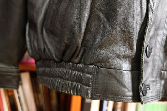 Giacca lunga in pelle nera