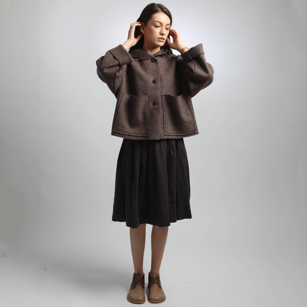 Giaccone UMMA Knotium oversize con cappuccio in lana cotta, marrone